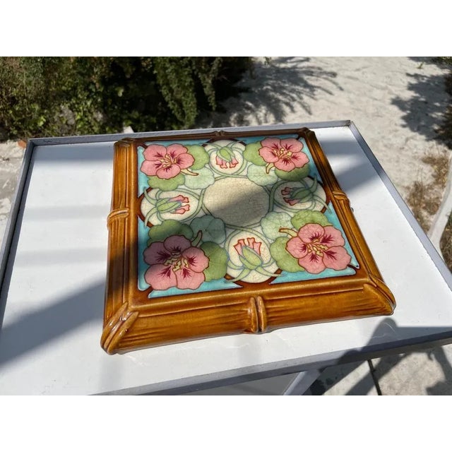 This bribe is typical of the work of Hippolyte Boulanger. This floral decoration with its green and orange colors, can be...