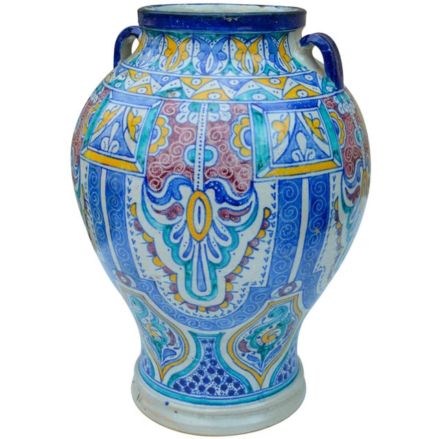 Handcrafted ceramic vase with handles featuring an elaborate hand-painted Moorish pattern in a traditional Andalusian...