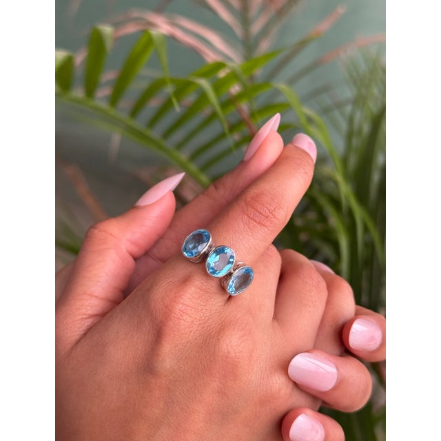 Classic 3 Stone Blue Topaz 7.24 Carat Oval Ring Set in Sterling Silver by Carat&her- Size 8 For Sale - Image 4 of 11
