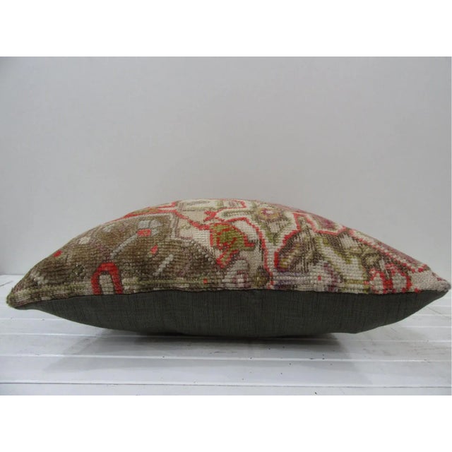 This is a pillow cover made from a vintage kilim rug. The piece was properly washed and ready to use. Pillow inserts not...