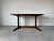 Beautiful vintage Mid Century Modern Danish dining table by Rasmus, crafted in Denmark and showcasing the timeless...