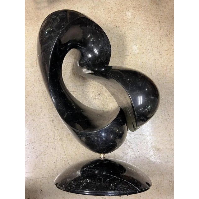 Large abstract mid century black marble sculpture by Ellen Brenner Sorensen.