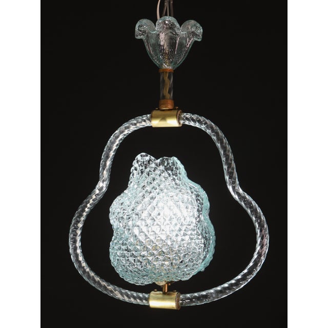 Extraordinary Murano chandelier by artist Ercole Barovier in rare blu color. The pendant consists of 6 glass elements and...