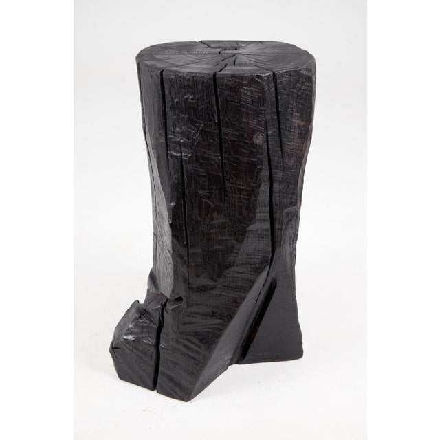 Chainsaw carved side table/pedestal. Carved from a single piece of burnt oak wood and protected with the highest quality...