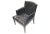 Mid-Century Modern black leather bergére with diamond button tufting, nailhead trim, and tapered wooden legs. No maker's...