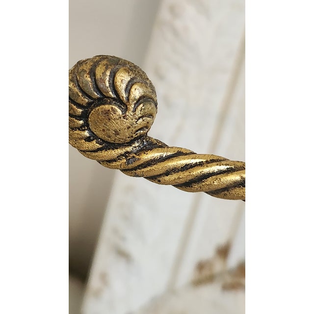 Elegant vintage countertop guest-towel stand featuring two gracefully curved, twisted-rope arms ending in sculptural...