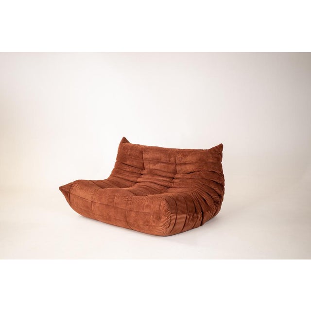 This Togo has been reupholstered with new foam and high-quality new fabric, keeping its inner structure, giving the item...