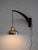 Scandinavian vintage walnut wall light with pendant brass lampshade and adjustable cable. Scandinavian vintage walnut wall...
