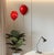 Add a unique accent to your space with this Red Polka Dot Ceramic balloon wall sculpture. Handcrafted from clay, and...