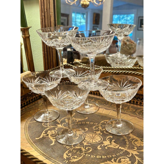 Classic crystal by Gorham, these champagne coupes were hand blown in Germany from 1960 - 1999. The “Cherrywood” pattern...
