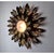 Superb and rare sun wall or ceiling lamp, designed and produced in Italy in the 1970s. This unique object is composed of...