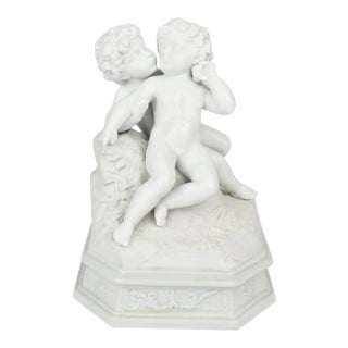Antique 19th Century French Bisque Figurine of Two Putti in an Amorous Embrace For Sale