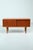 Hundevad lowboard made of teak veneer and with 2 sliding doors. This cabinet has new legs. Unfortunately it has only one...