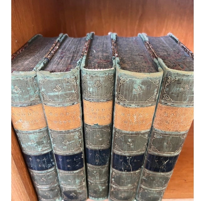 A stunning 5-volume antique library set of the works of Thomas Hood, published by G.P. Putnam and Son in 18691870. This...