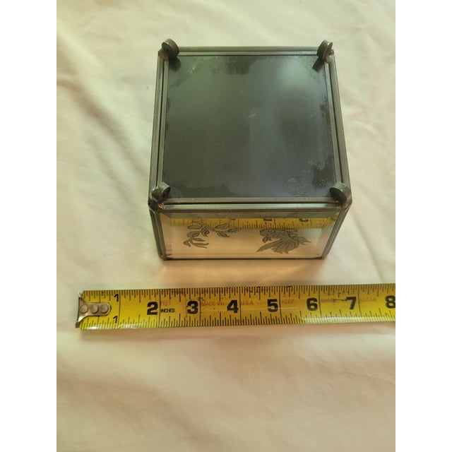 This unique vintage box features mirrored panels and a beautifully etched design of a goldfish swimming amongst aquatic...