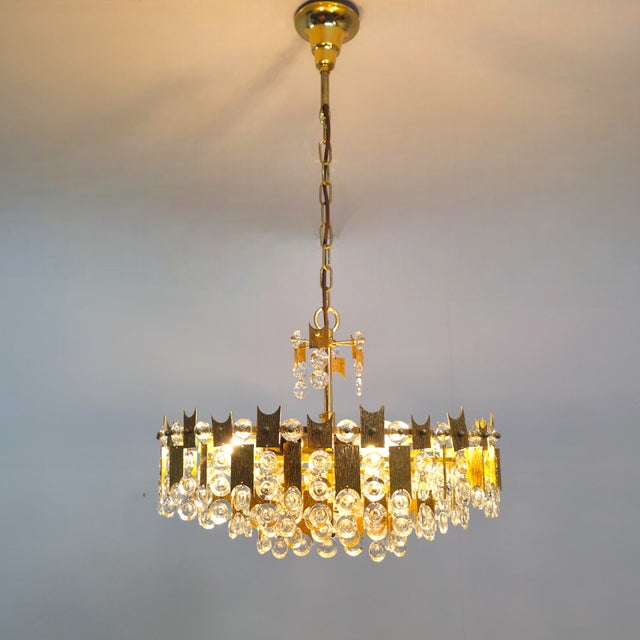 Brutalist Brass and Glass Chandelier by Sciolari for Palwa, 1970s, in Very Good conditions. Designed 1970 to 1979 I have...