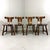Set of 4 sturdy brutalist dining chairs. Solid oak with nice wooden joints in the seat, the rounded backrest and the legs...
