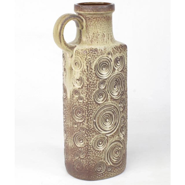 Large glazed ceramic brown jug with mottled taupe glaze and concentric circle detail by Scheurich Keramik West, Germany....