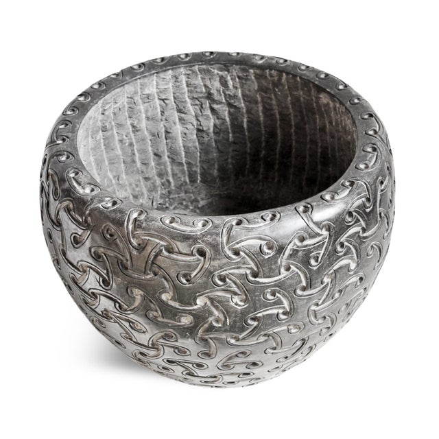 Vintage hand carved solid black marble bowl with repeating woven geometric design. Opening at top measures 19" diameter....