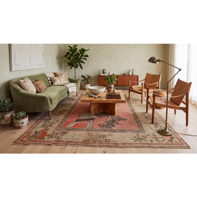 This exquisite 19th-century antique Samarkand (East Turkestan) rug features a captivating pictorial central field in warm...