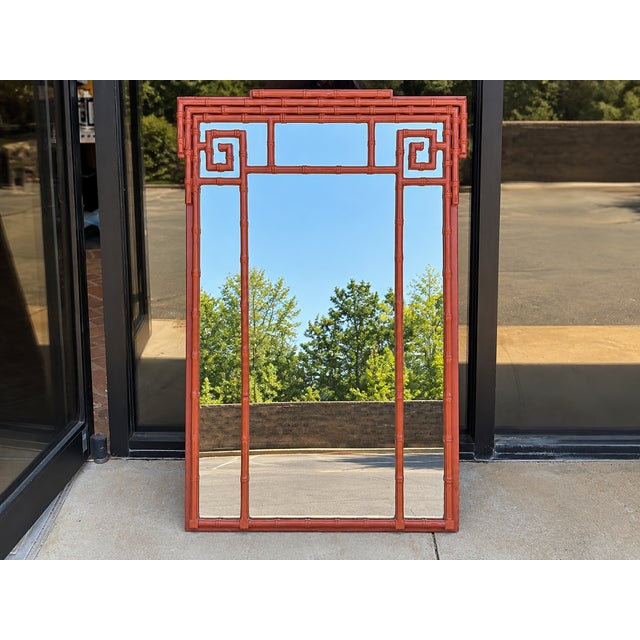 This is a mid-century Hollywood Regency Era faux bamboo mirror with a timeless Greek Key form. The color is original and...