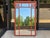 This is a mid-century Hollywood Regency Era faux bamboo mirror with a timeless Greek Key form. The color is original and...