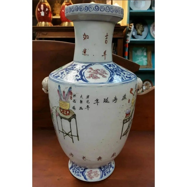 This is a 1881 Chinese Famille Rose Wucai Jingdezhen Porcelain Figural/Auspicious Symbol Motifs Baluster Vase Decorated by...