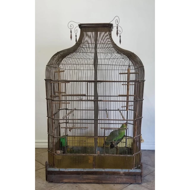France or English Victorian Birdcage - Circa 1860 - Large wood and wire metal birdcage. The cage has two doors and two...
