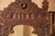 This vintage Moroccan architectural mirror is a striking decorative piece featuring intricate hand-carved wood detailing...