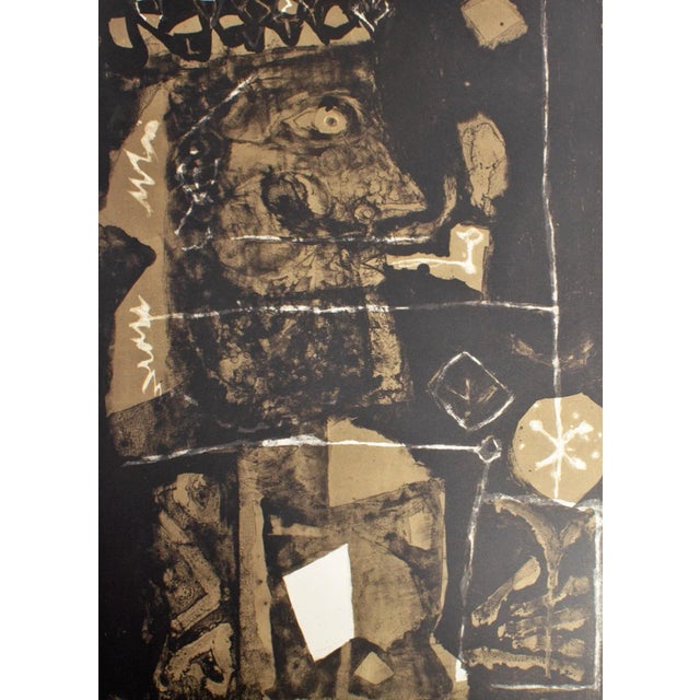 A 1958 lithograph by the Spanish-Catalan artist Antoni Clavé (1913-2005). Titled "Roi a la Pipe," this abstract work...