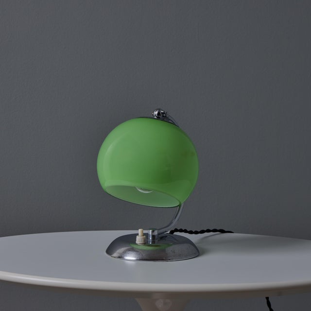 1950s Mauri Almari Chrome and Opaline Green Glass Table Lamp for Idman Oy A rare and elegant lamp executed in chromed...