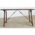 A multi-purpose Spanish fratino table dating to the 18th century, made of walnut construction with a single plank on top...