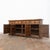 An imposing antique Spanish sideboard in solid pine, remarkable for its highly architectural facade and substantial...