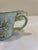 Vintage set of four Provistone Rose Marie ceramic mugs made in Japan featuring embossed detailing and soft floral patterns...