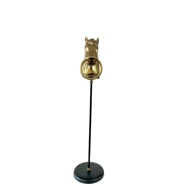 Charming brass finish race horse head on a black stand. Brass plated metal in black painted metal stand. Possible uses:...
