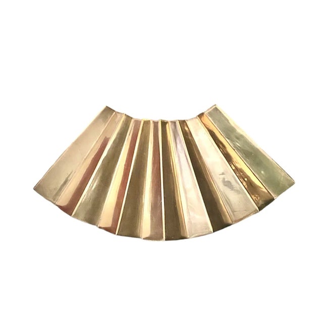 A gorgeous, vintage brass eventail/fan shaped box. Features a postmodern, geometric design in solid brass. Made in India....