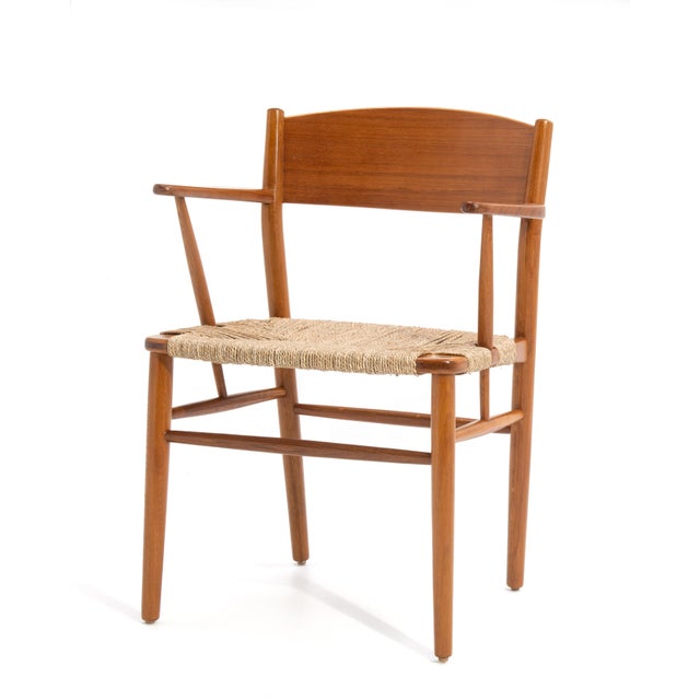A nicely restored Mid-Century armchair manufactured by Søborg Møbler in Denmark and designed by Børge Mogensen. Teak and...