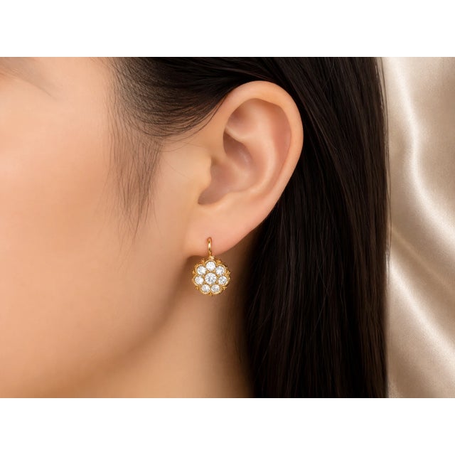 Material: 14K Gold - elegant and durable Stones: 16 Fianits - arranged in a floral pattern Style: Floral Design - delicate...