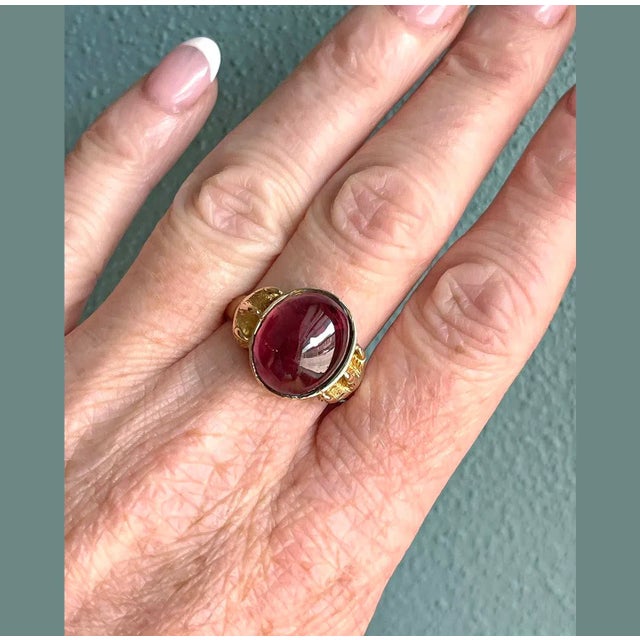 Step back to a time of refined elegance with this Victorian Garnet Signet Ring, a splendid piece that exudes the charm of...