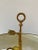 A classic bouillotte lamp rendered in warm brass, distinguished by its sculptural double dolphin motif and clean, tailored...