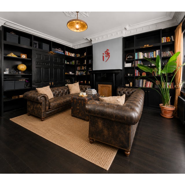Offered for sale is a Restoration Hardware Kensington 96" sofas in Glove-colored leather (Item #59820010). (2 available)...