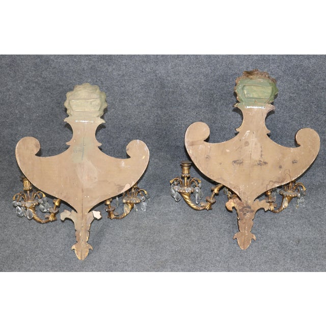 Dimensions: 27.5 inches high x 23.5 inches wide x 13.75 inches deep Highly decorative pair of antique English turn of the...