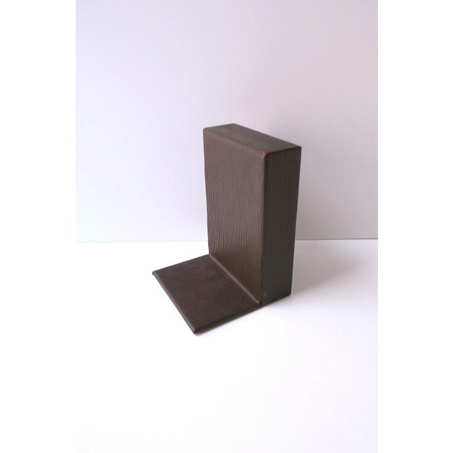 A single (one) rich brown epi leather booked, in the style of French Masion, Louis Vuitton (LV), in the Modern or...