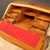 French bureau from the mid-20th century. Moved and rounded furniture inlaid with floral decorations in rosewood, maple,...