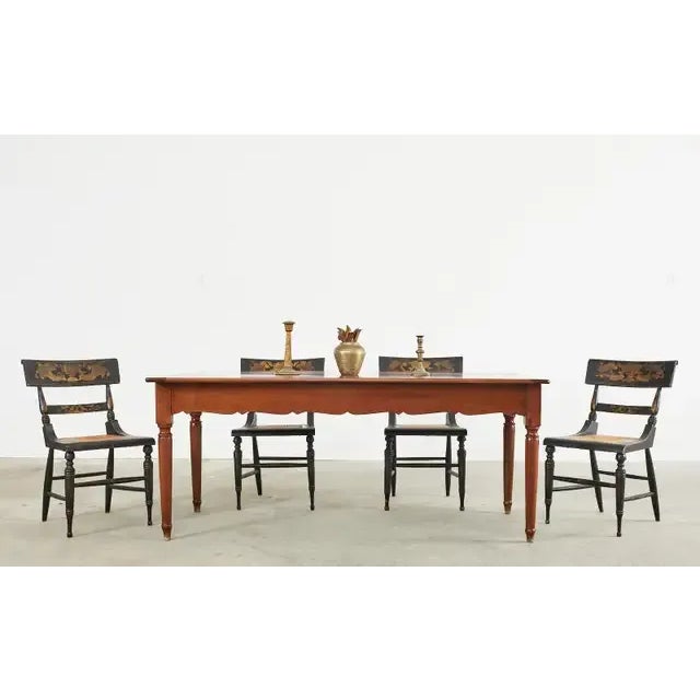 Elegant 19th century French Louis Philippe farmhouse dining table or harvest table crafted from fruitwood. Constructed...