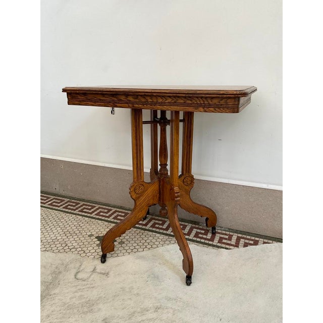 Infuse your space with classic 19th-century elegance with this exceptional antique Eastlake-style American Victorian...
