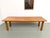 This large, brutalist-style dining table from the 1970s, crafted entirely from solid oak, is distinguished by its clean,...