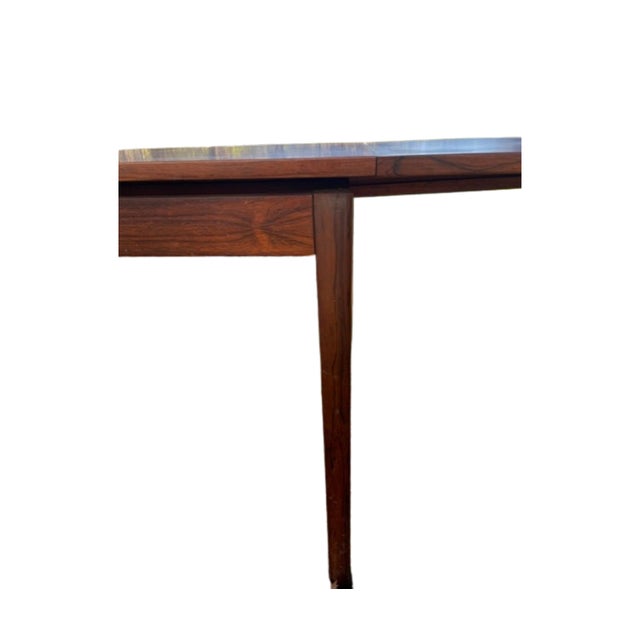 Mid century modern (c1960) Swedish Rosewood dining table from the Skaraborgs Mobelindustri furniture company in Sweden....