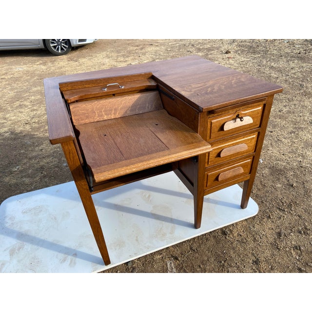 Antique typewriter oak desk , top is not leveled could use some adjusting and there are some wood imperfections see...
