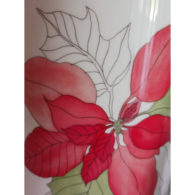 Festive dinnerware from Portugal made between 1984 and 1998, after which it was discontinued. The style is a modern...